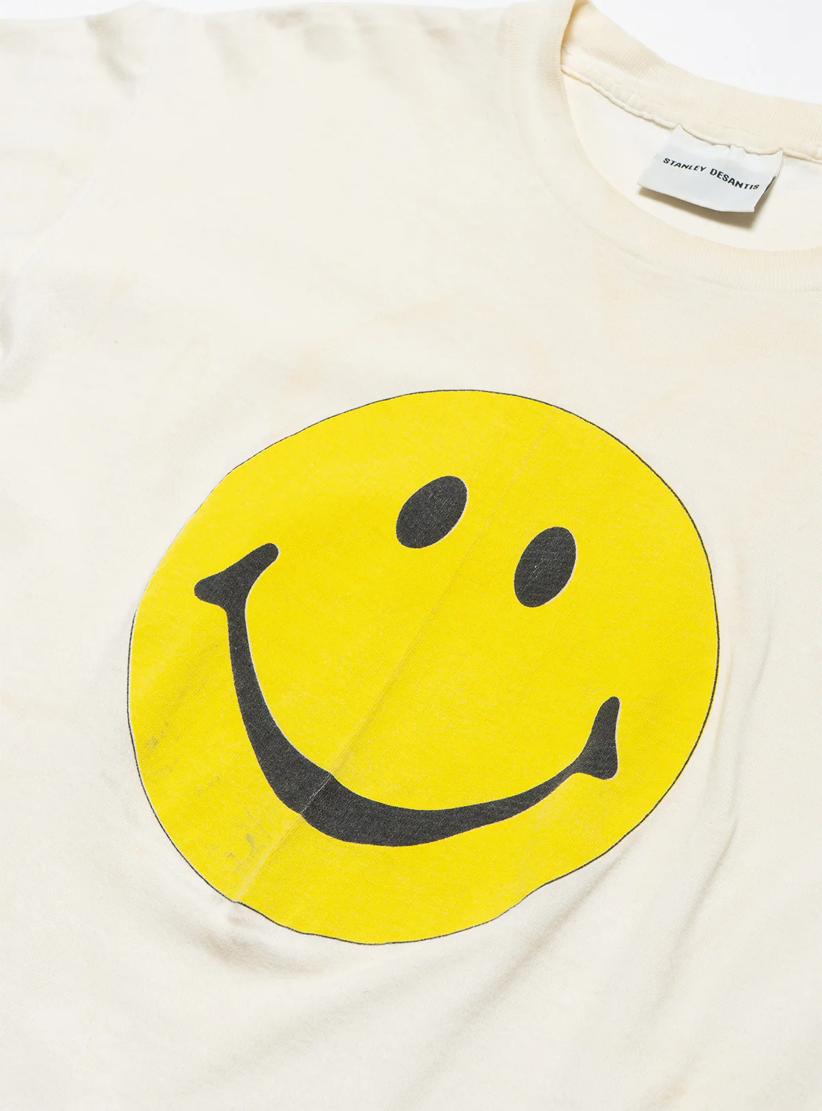 1965-vintage-stanley-desantis-smiley-face-tee-2.webp Vintage Stanley Desantis Smiley Face Tee