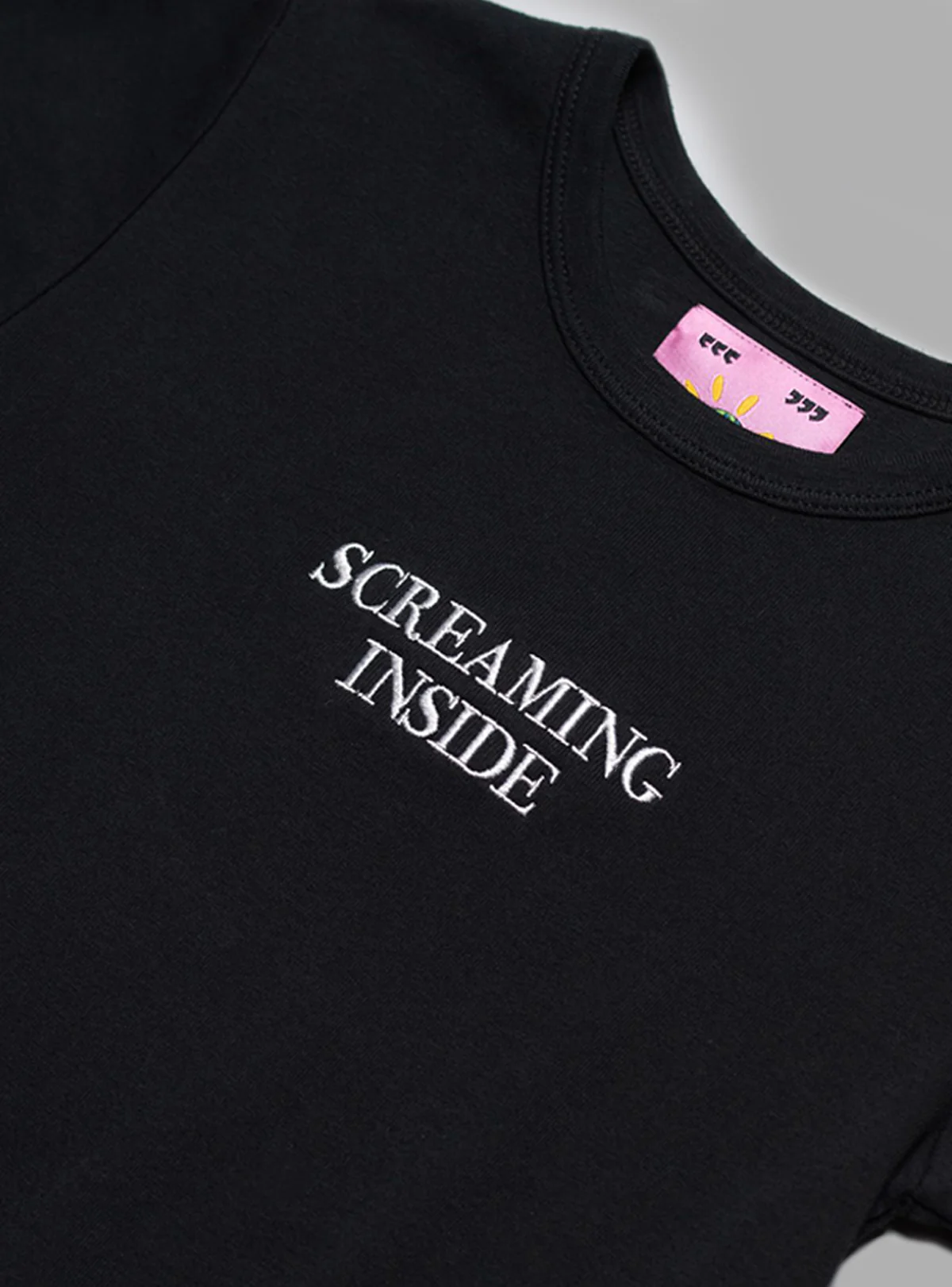 658-screaming-inside-baby-tee-2.webp Screaming Inside Baby Tee